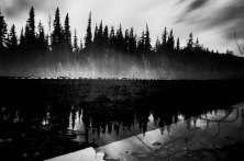 Accidental double exposure. The image is of a little pond along the road to Boreas Pass, Coloardo. The second image is of the track for High Plains Raceway, in Colorado. Ilford ISO 50 film, exposures are roughly 10 seconds for the first image and 8 for the second image.